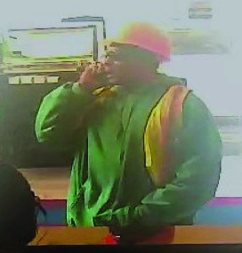Man in construction uniform robs Alexandria bank