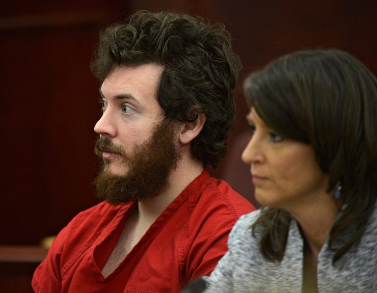 FILE - In this March 12, 2013 file photo, James Holmes, left, and defense attorney Tamara Brady appear in district court in Centennial, Colo. for his arraignment. Holmes, the suspect in the Colorado theater massacre, could enter his long-expected insanity plea at a hearing Tuesday June 4, 2013, though the case could also veer off on another tangent as his lawyers seek the strongest possible defense. (AP Photo/The Denver Post, RJ Sangosti, Pool, File)