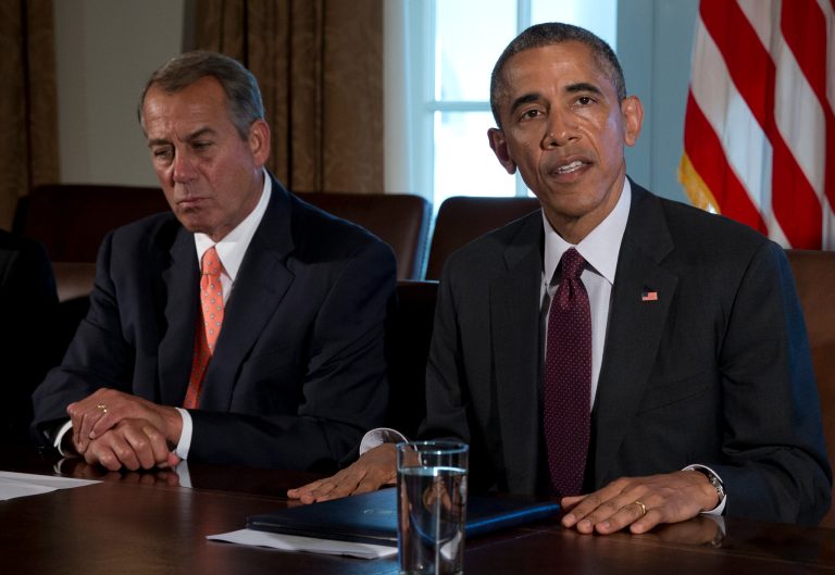 House Speaker John Boehner of Ohio listens at left as President Barack Obama speaks to media during his meeting with bipartisan, bicameral leadership of Congress to discuss a wide range of issues, Tuesday, Jan. 13, 2015, in the Cabinet Room of the White House in Washington. (AP Photo/Carolyn Kaster)