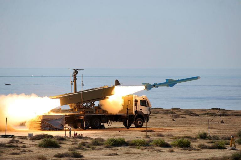 In this picture released by Iranian Students News Agency, ISNA, on Monday, Jan. 2, 2012, a Ghader missile is launched at the shore of sea of Oman during Iran's navy drill. 