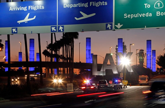 Airline catering workers block traffic, cause disruptions at protest near LAX Airline catering workers block traffic, cause disruptions at protest near LAX