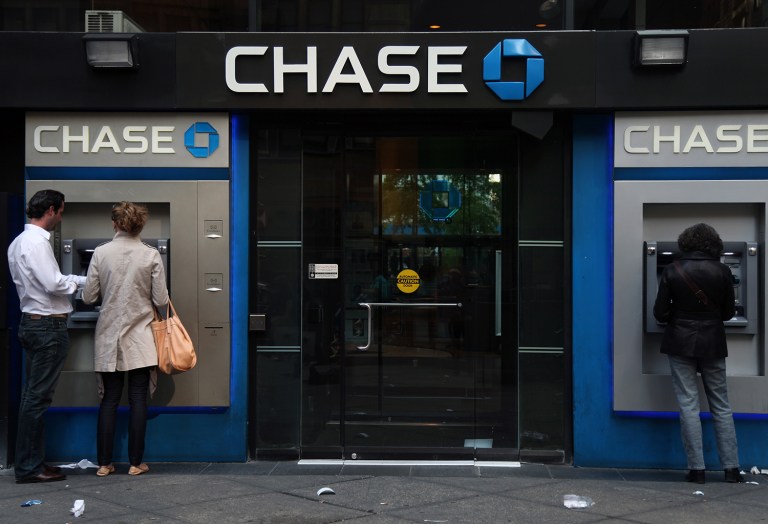 Seventy-seven million Americans have at least one delinquent debt on their credit report. (AP Photo/CX Matiash)