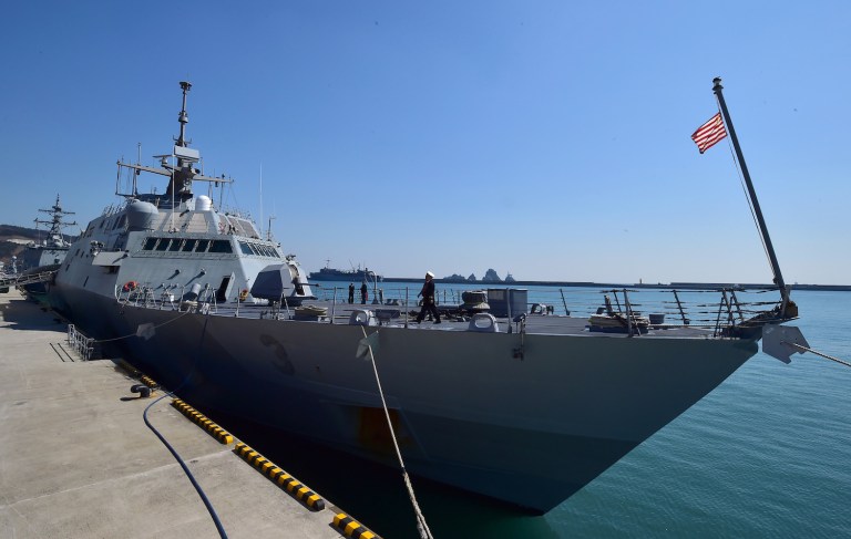 The White House immediately intervened and the Navy reversed course, saying it would amend its budget to request the additional ship. (AFP PHOTO / POOL / JUNG YEON-JE)