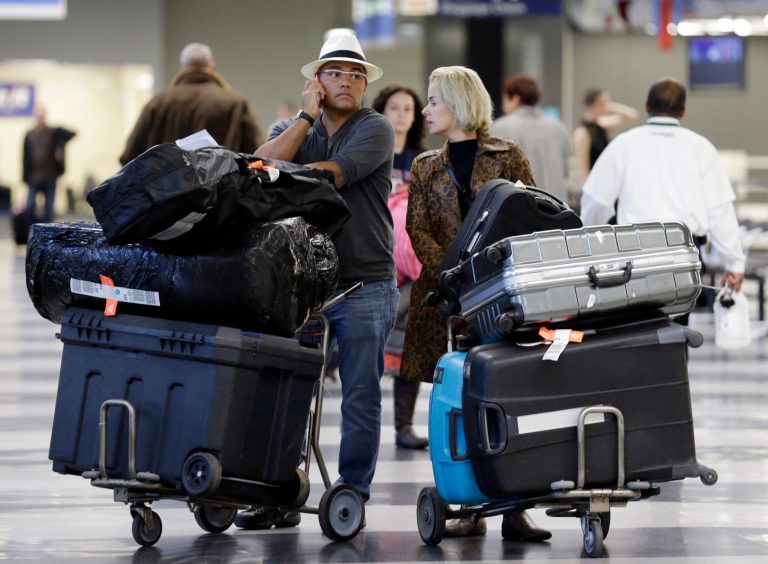 Airlines collecting less money for bag fees