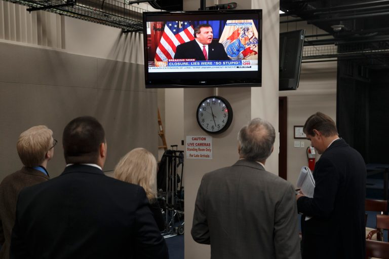 Capitol Hill reporters watch a news conference with New Jersey Gov. Chris Christie while waiting for House John Boehner's of Ohio news conference on Capitol Hill in Washington, Thursday, Jan. 9, 2014. Boehner said he believes Gov. Chris Christie remains a serious contender for the Republican 2016 presidential nomination, despite the traffic jam scandal engulfing the New Jersey governor. (AP Photo/J. Scott Applewhite)