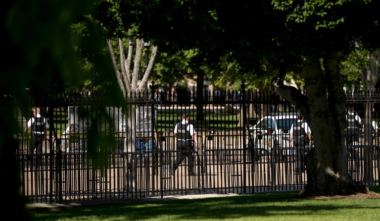 The U.S. Secret Service, in partnership with the National Park Service, said in recent months it supporting a new plan to raise the height of the security fence around the president's residence by five feet and add a concrete foundation. (AP Photo/Andrew Harnik)