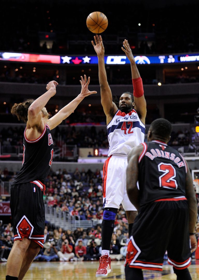 Nick Wass/AP
Nene finished with a team-high 16 points, six rebounds and four assists in the Wizards' victory over the Bulls on Saturday.
