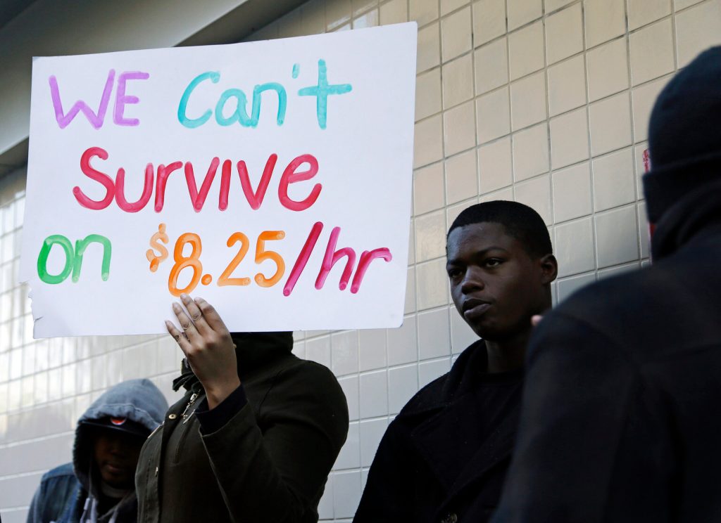 Democratic platform backs $15 minimum wage