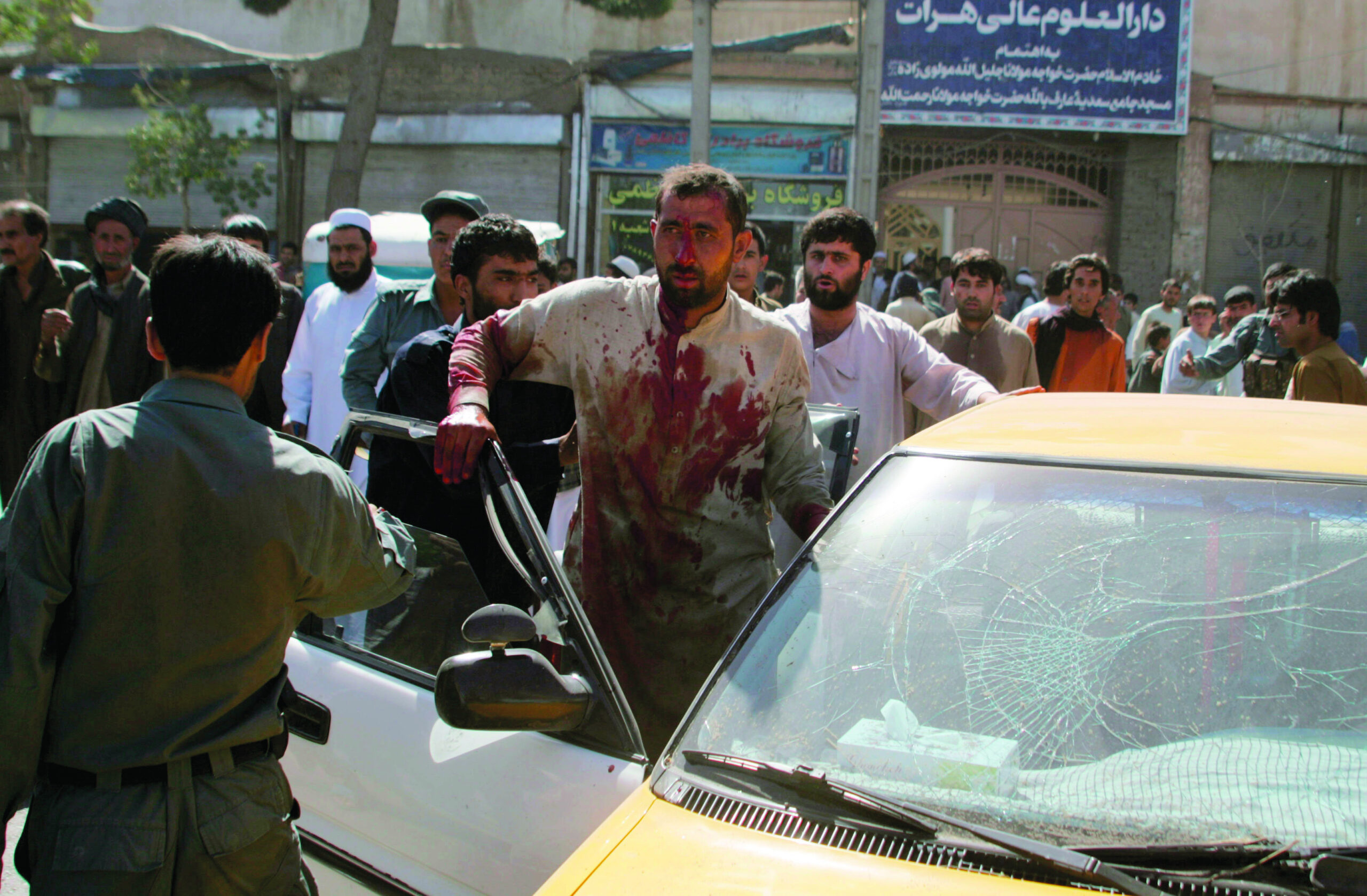 Grenades at Afghan mosque, bicycle bomb injure 23