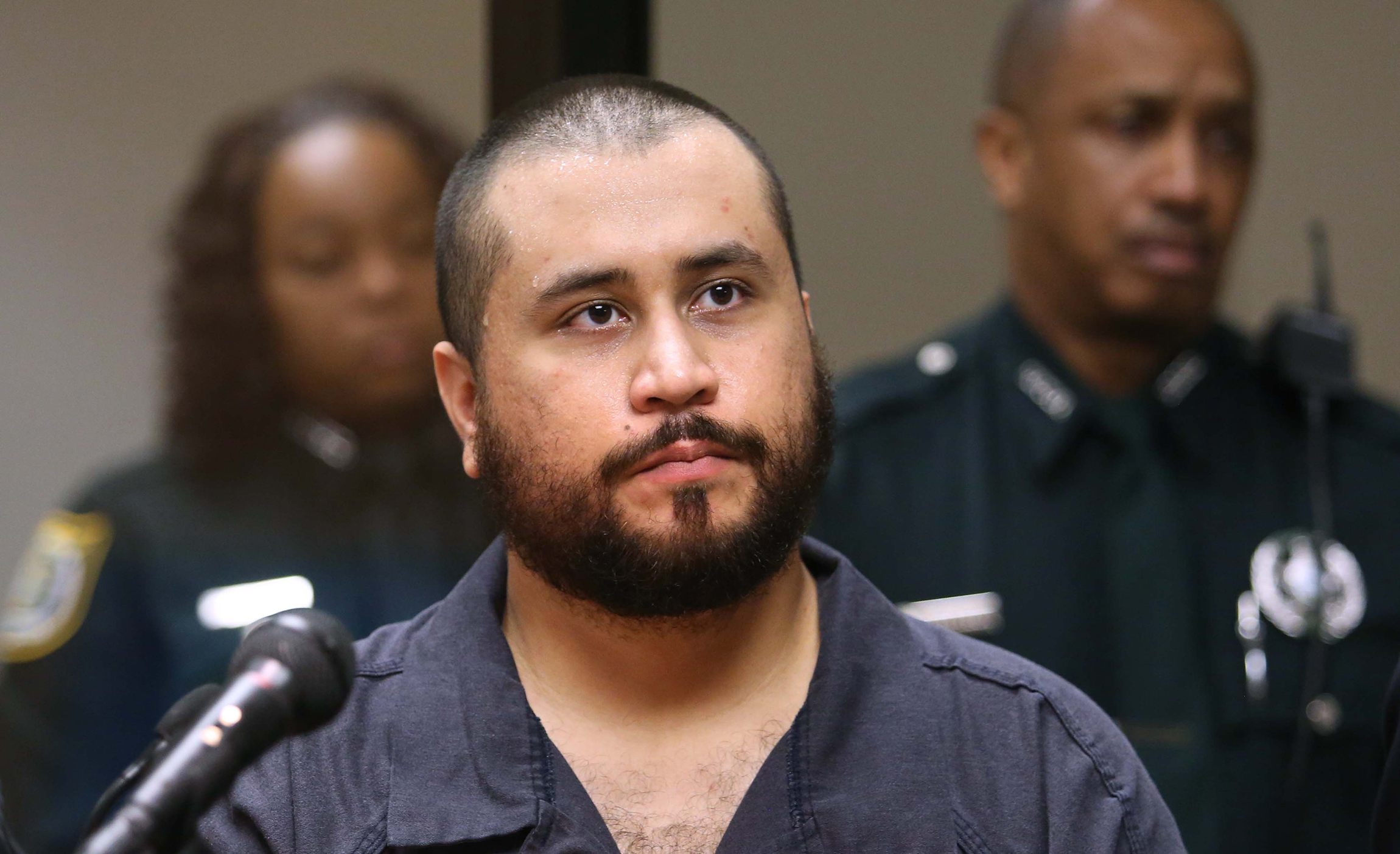 George Zimmerman punched in the face by stranger