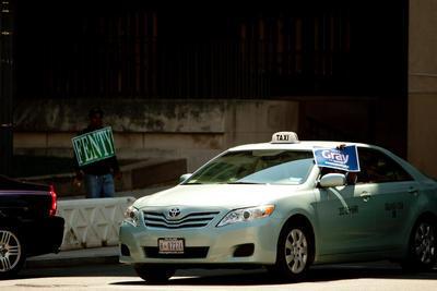 A taxi drivers lays on his horn and shows his support after seeing Mayoral Candidate Vincent Gray. Mayoral candidates Adrian Fenty and Vincent Gray the day before the District's democratic primary. In Washington, DC on Monday September 13, 2010.