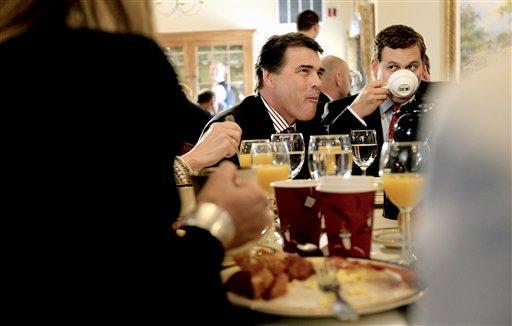 Perry opposes Romney on global warming