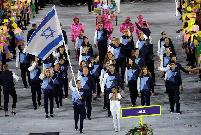 The Israeli team tried to board a bus to the opening ceremonies, when the Lebanese delegation tried to physically block them, sources say. (AP Photo/Matt Slocum)