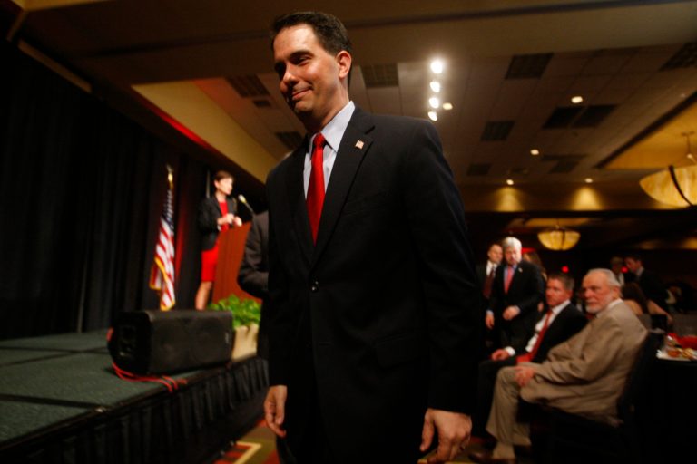 Wisconsin Gov. Scott Walker delivers an address at a fundraising event for the Iowa GOP on Thursday, May 23, 2013 at the Sheraton Hotel in West Des Moines, Iowa. (AP Photo/The Des Moines Register, Charlie Litchfield)