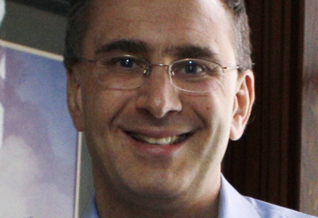 In this Feb. 8, 2011 file photo, Jonathan Gruber poses in his home in Lexington, Mass. (AP Photo/Charles Krupa, File)