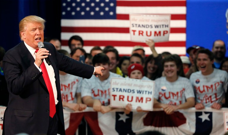 Donald Trump campaigns on preserving Social Security, defending veterans, and sticking up for cops. (AP Photo/Charles Rex Arbogast)