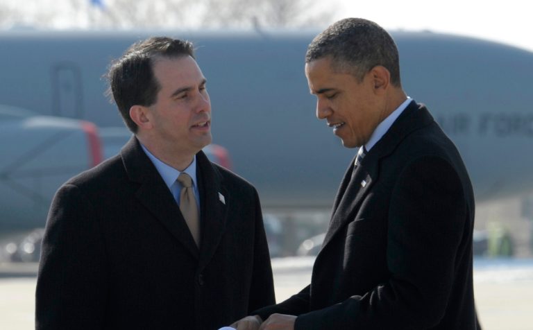 A new poll says Wisconsin Gov. Scott Walker, left, has a 50 percent approval rating among voters in the state -- similar to the 48 percent approval rating President Obama has there. (AP File)