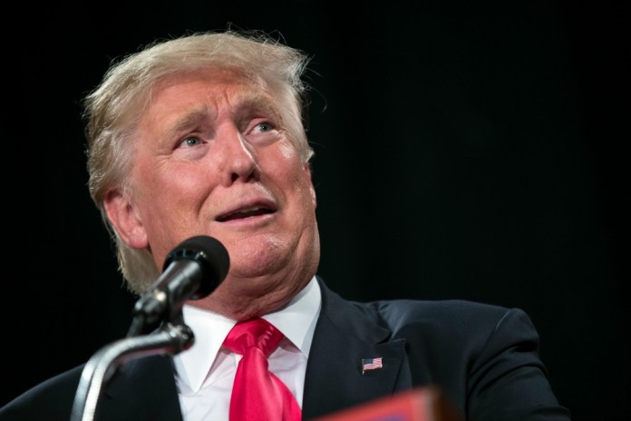 "Sad to watch Bernie Sanders abandon his revolution," Donald Trump tweeted. "We welcome all voters who want to fix our rigged system and bring back our jobs." (AP Photo)