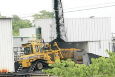 Examiner file
Coal is moved at the Potomac River Generating Station. GenOn's coal-fired power plant in Alexandria is scheduled to close on Oct. 1, 2012.