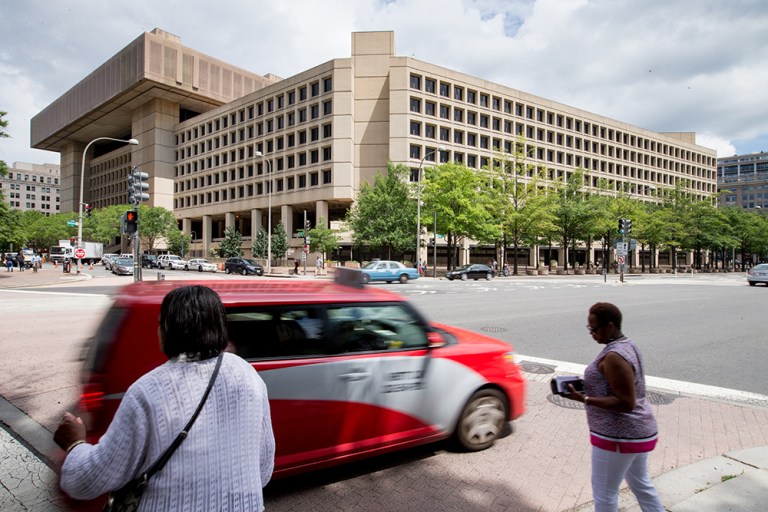In exchange for the deed to the iconic J. Edgar Hoover Federal Building on Pennsylvania Avenue, the winning contractor will build a new 2.1 million square foot FBI headquarters in either Prince George's County, Md. or Springfield, Va. (AP Photo/Andrew Harnik)