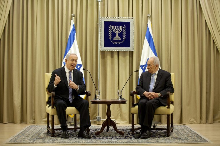 Israeli Prime Minister Benjamin Netanyahu, left, and Israeli President Simon Peres speak during a brief ceremony in the president's residence, on Saturday, March 2, 2013 in Jerusalem, Israel. (AP Photo/Uriel Sinai, Pool)