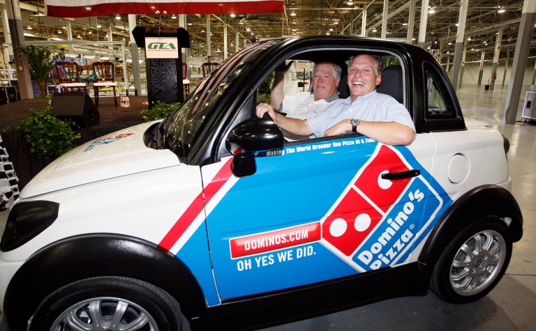 Former Mississippi governor, and GreenTech Automotive chairman Terry McAuliffe, right, after the unveiling of the company's new electric MyCar. (AP Photo/Rogelio V. Solis)