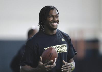 Tony Gutierrez/AP
Baylor quarterback and Heisman Trophy winner Robert Griffin III likely will be the Redskins'selection with the No. 2 pick in the draft later this month.