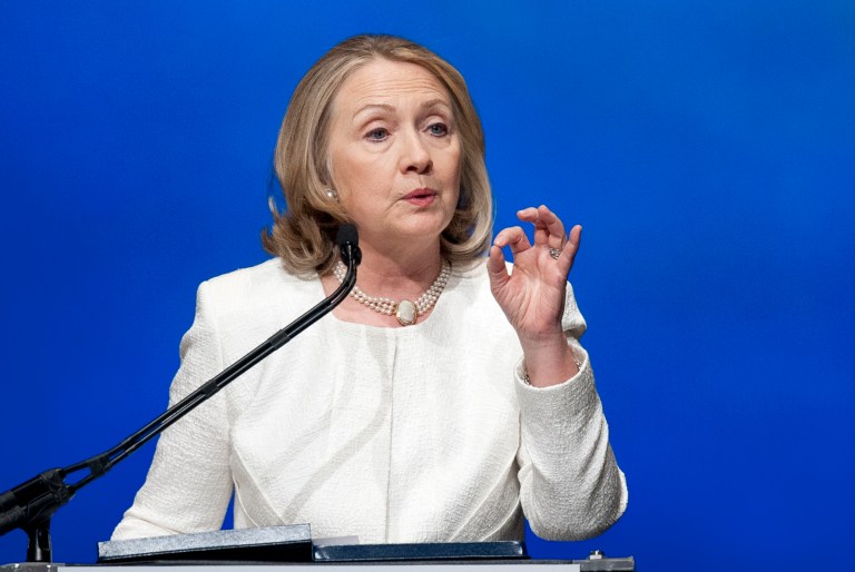 FILE - This April 2, 2013 file photo shows former Secretary of State Hillary Rodham Clinton addressing the Vital Voices Global Partnership 2013 Global Leadership Awards gala at the Kennedy Center for the Performing Arts in Washington. Clinton is working on a memoir and policy book about her years with the Obama administration, Simon & Schuster told The Associated Press on Thursday, April 4. The book is currently untitled and tentatively scheduled for June 2014. (AP Photo/Cliff Owen)