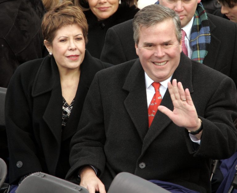 Florida Gov. Jeb Bush and his wife Columba wave to the crowd. (Mark Wilson/Getty Images)