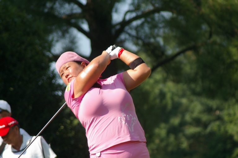  Times have been tough recently for Christina Kim as she battles depression, but many LPGA fans are on her side as she tries to regain her game and find happiness. / Photo by Kevin Dunleavy 