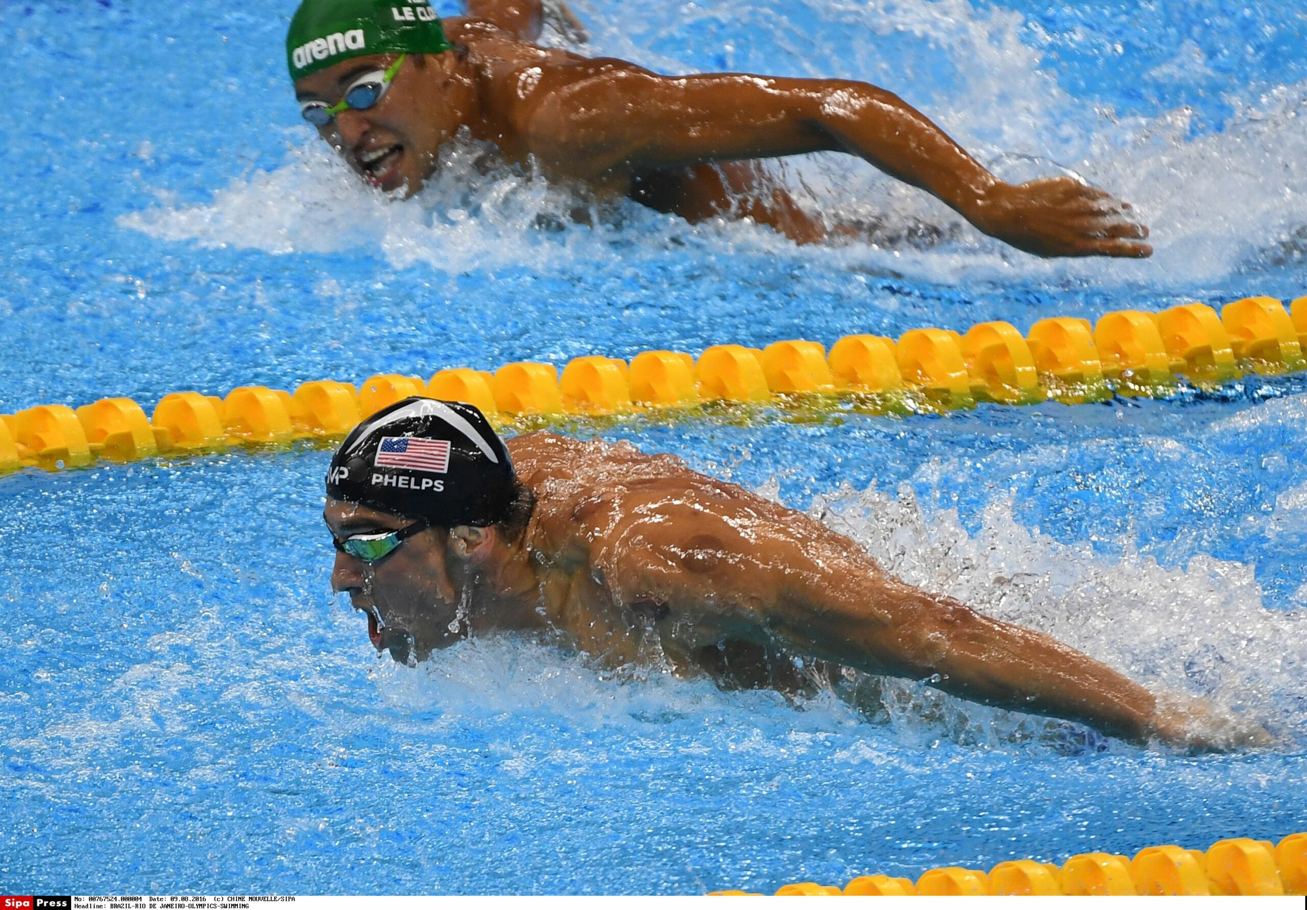 Michael Phelps Wins Gold Medals 20 and 21