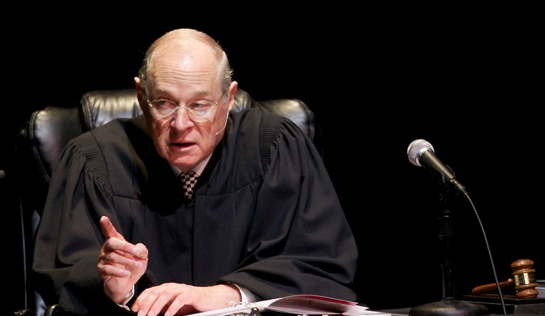 Kennedy's administrative stay temporarily halts the 9th Circuit Court of Appeals decision last week that ruled against the Trump administration's interpretation of the controversial travel ban. (AP Photo/Damian Dovarganes, File)
