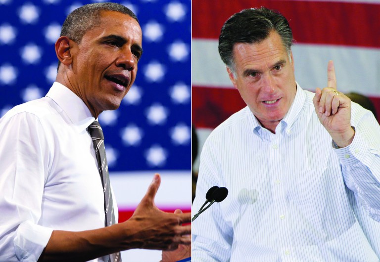 FILE - This combination of 2012 file photos shows U.S. President Barack Obama, left, and Republican presidential candidate Mitt Romney in Boulder, Colo. and Cape Canaveral, Fla. Campaign finance filings with the government now show that the cost of the 2012 U.S. presidential race has surpassed $2 billion, a new record. The new tallies released Thursday, Dec. 6, 2012, which include nearly $86 million in fundraising by Republican presidential nominee Mitt Romney in the election's final weeks, boosted the total campaign haul over the $2 billion mark. (AP Photo/Carolyn Kaster, Charles Dharapak)