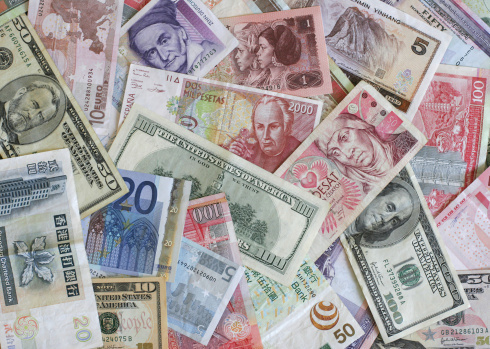 The Justice Department is taking a leading role in a global investigation into possible manipulation of the $5.3 trillion-a-day foreign exchange market, a department official said Tuesday. (Photo: Thinkstock)