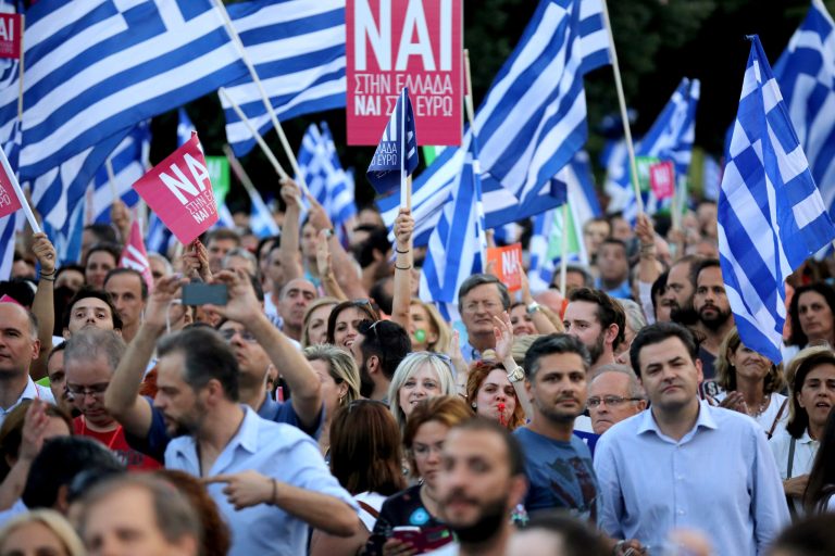 Supporters of the 'Yes' campaign attend a rally and listen to speeches at the Olympic Stadium in preparation for Sunday's referendum on July 3, 2015 in Athens, Greece. The 'Yes' and 'No' supporters in Greece are holding major rallies in Athens today ahead of Sunday's referendum on an international bailout terms. (Photo by Christopher Furlong/Getty Images)