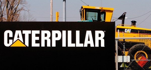 Caterpillar posts record profit after raising prices to cover Trump tariffs