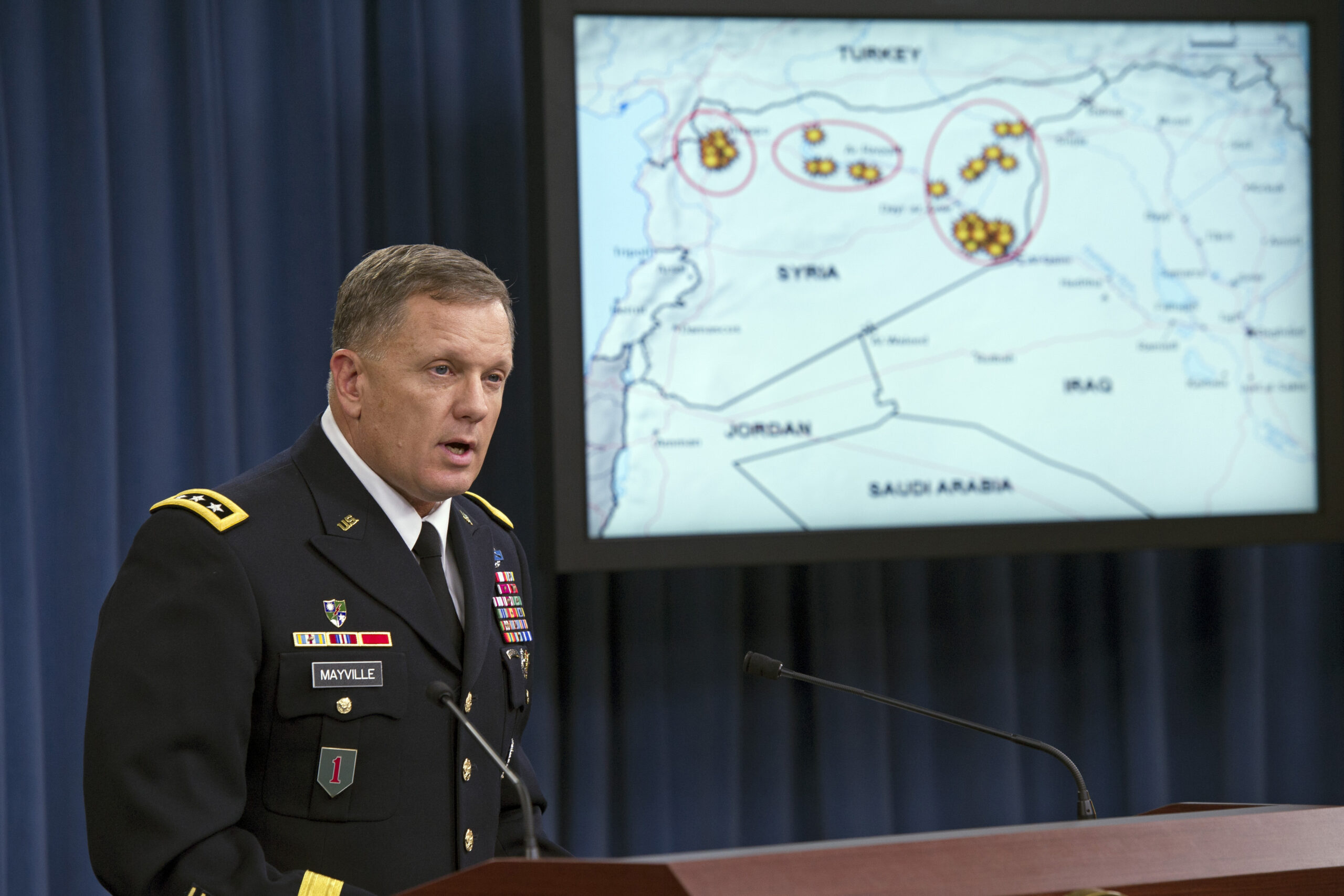 Civilian casualty standard eased in Iraq, Syria