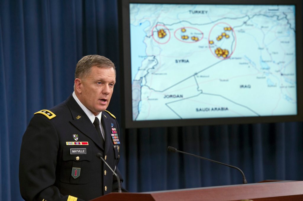 Civilian casualty standard eased in Iraq, Syria