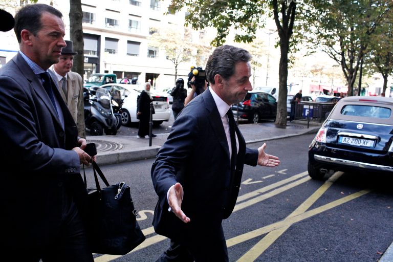 Former French President Nicolas Sarkozy arrives at an hote in Paris, Friday, Sept. 19, 2014. Sarkozy is expected to announce his political come-back this weekend. (AP Photo/Thibault Camus)