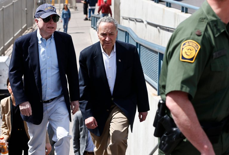 U.S. Sen. John McCain, R-Ariz., left, and Sen. Chuck Schumer, D-N.Y., tour the Nogales port of entry during their tour of the Mexico border with the United States on Wednesday, March 27, 2013, in Nogales, Ariz. (AP Photo/Ross D. Franklin)