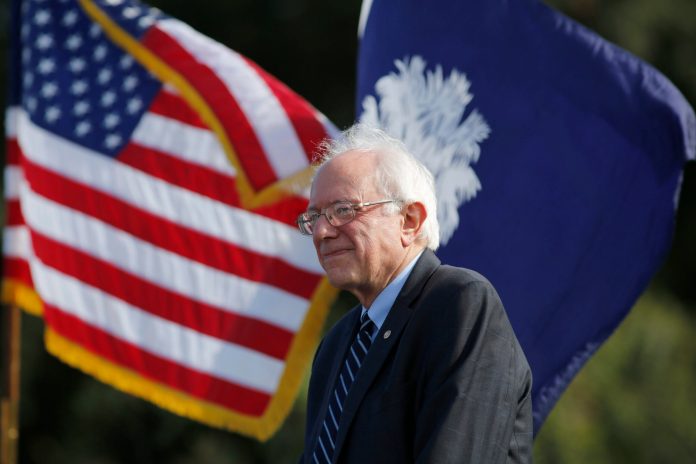 "We must reinvent how we police America," Sanders said. (AP Photo/Mic Smith)
