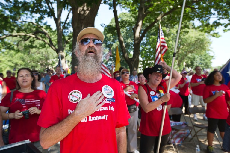 People opposed to immigration legislation currently in Congress gather at a rally on Capitol Hill in Washington, Monday, July 15, 2013. The event is sponsored by a group called the Black American Leadership Alliance, which, in their words, does not want to 