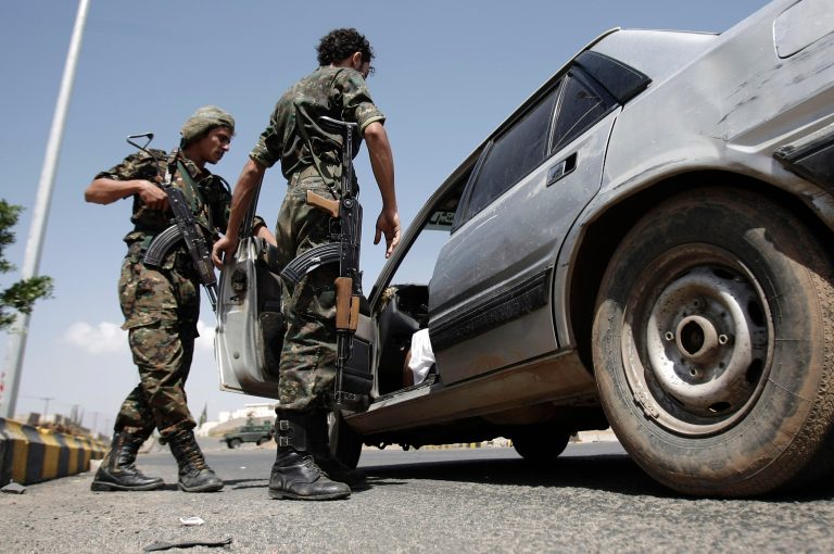   Yemeni soldiers inspect a car at a checkpoint on a street leading to the U.S. and British embassies in Sanaa, Yemen, Saturday, Aug. 10, 2013. Eighteen U.S. diplomatic outposts closed because of a terrorist threat will reopen Sunday, but the U.S. Embassy in Yemen will remain closed due to State Department ongoing concerns about potential terrorist attacks by al-Qaida in the Arabian Peninsula. (AP Photo/Hani Mohammed)  