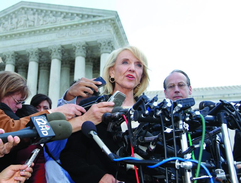 FILE - In this Wednesday, April 25, 2012 file photo, Arizona Gov. Jan Brewer speaks to reporters after the Supreme Court questioned Arizona's 