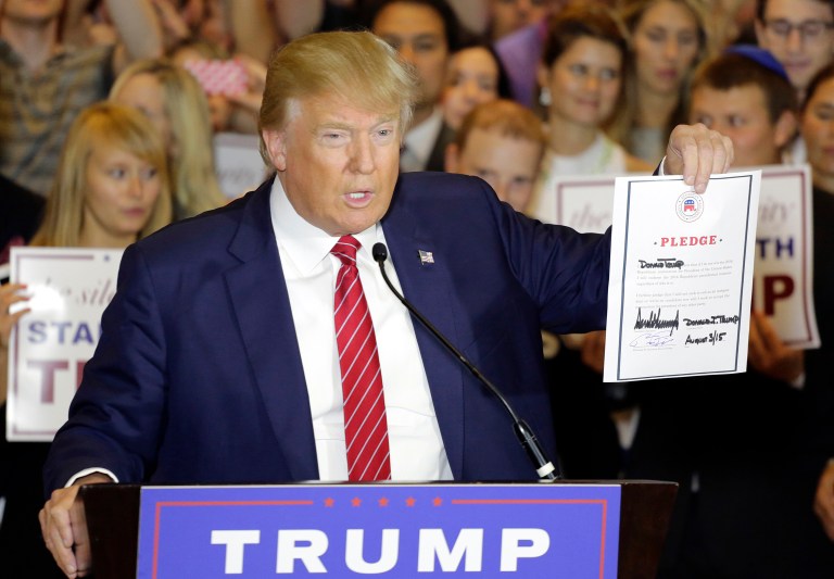 After initially refusing, by September of 2015, Donald Trump agreed to support the eventual nominee. (AP Photo/Mark Lennihan)