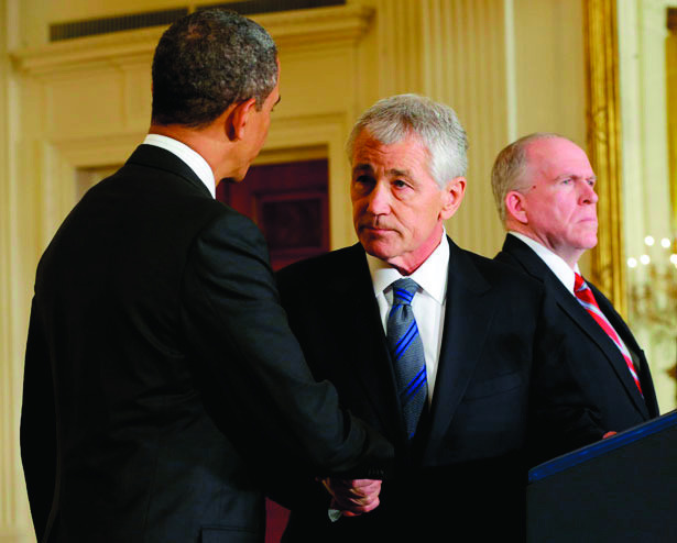 President Barack Obama shakes hands with his choice for Defense Secretary, former Nebraska Senator Chuck Hagel. (AP Photo/Pablo Martinez Monsivais)