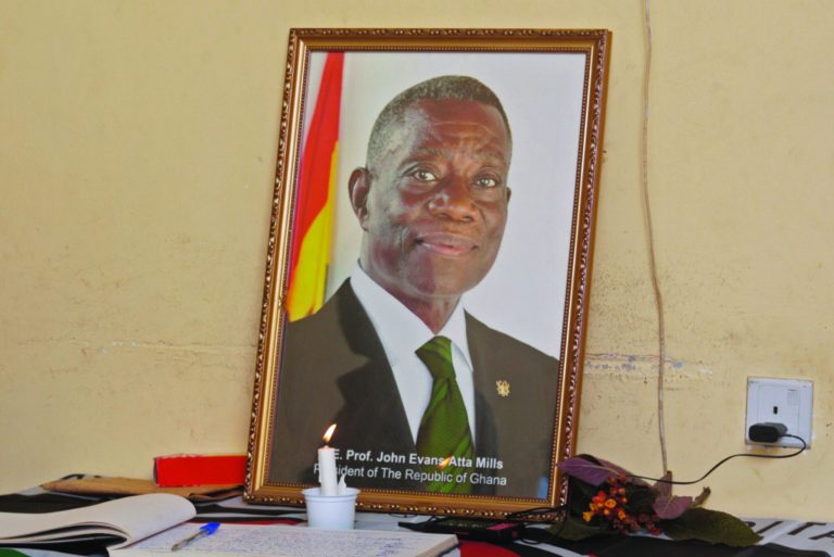 A book of remembrance for the late Ghana President John Atta Mills, in the photo, is seen at his party headquarters in Accra, Ghana, Wednesday, July 25, 2012. President John Atta Mills' election victory secured Ghana's reputation as one of the most mature democracies in West Africa, a position further solidified Tuesday when the vice president took over only hours after the 68-year-old president died five months before finishing his first term. (AP Photo/Christian Thompson)