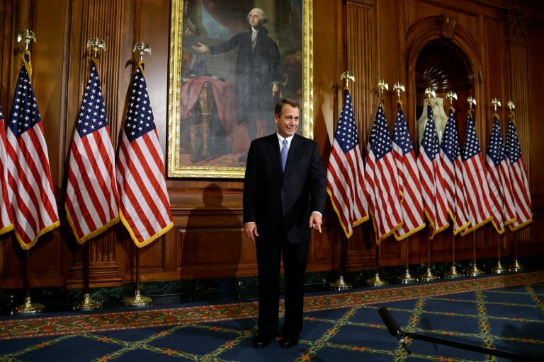 House Speaker John Boehner of Ohio points to a microphone in between performing mock swearing ins, Thursday, Jan. 3, 2013, on Capitol Hill in Washington, as the 113th Congress began. (AP Photo/Charles Dharapak)