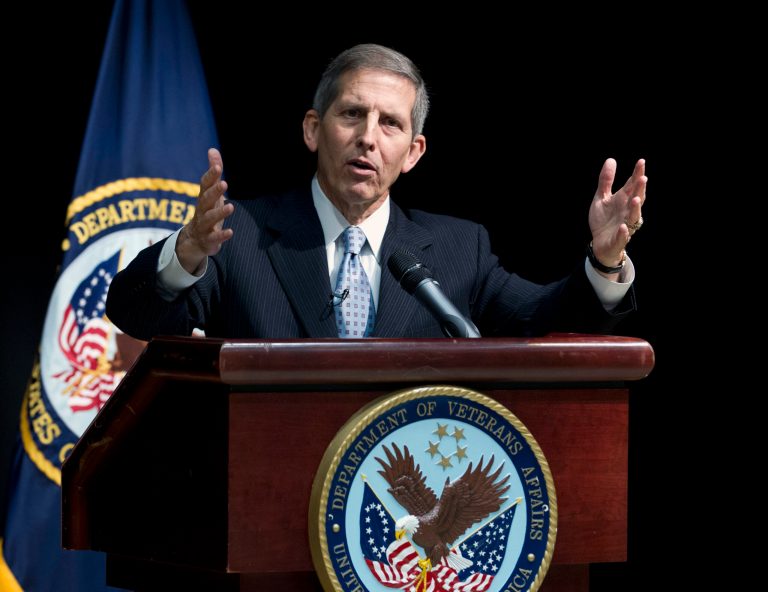 Acting Veterans Affairs Secretary Sloan Gibson speaks during a news conference at the VA Medical Center in Washington, Wednesday, June 18, 2014. The Veterans Affairs Department (VA) release the results from its Nationwide Access Audit, along with facility level patient access data for all Veterans health facilities. (AP Photo/Jose Luis Magana)