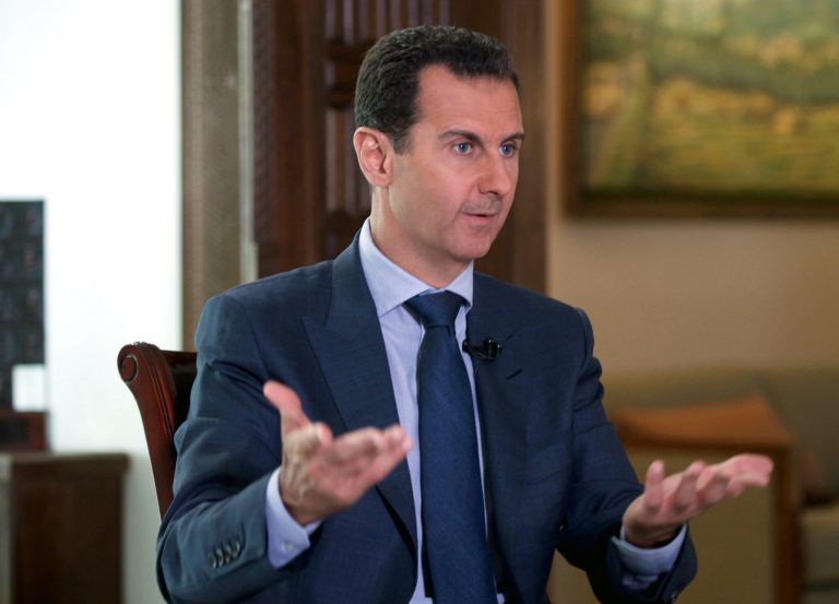 Syrian President Bashar Assad told Yahoo News that reports of torture and mass killings in his country are just 'fake news.' (Syrian Presidency via AP)